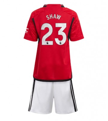 Manchester United Luke Shaw #23 Hemmatröja Barn 2023-24 Kortärmad (+ Korta byxor)